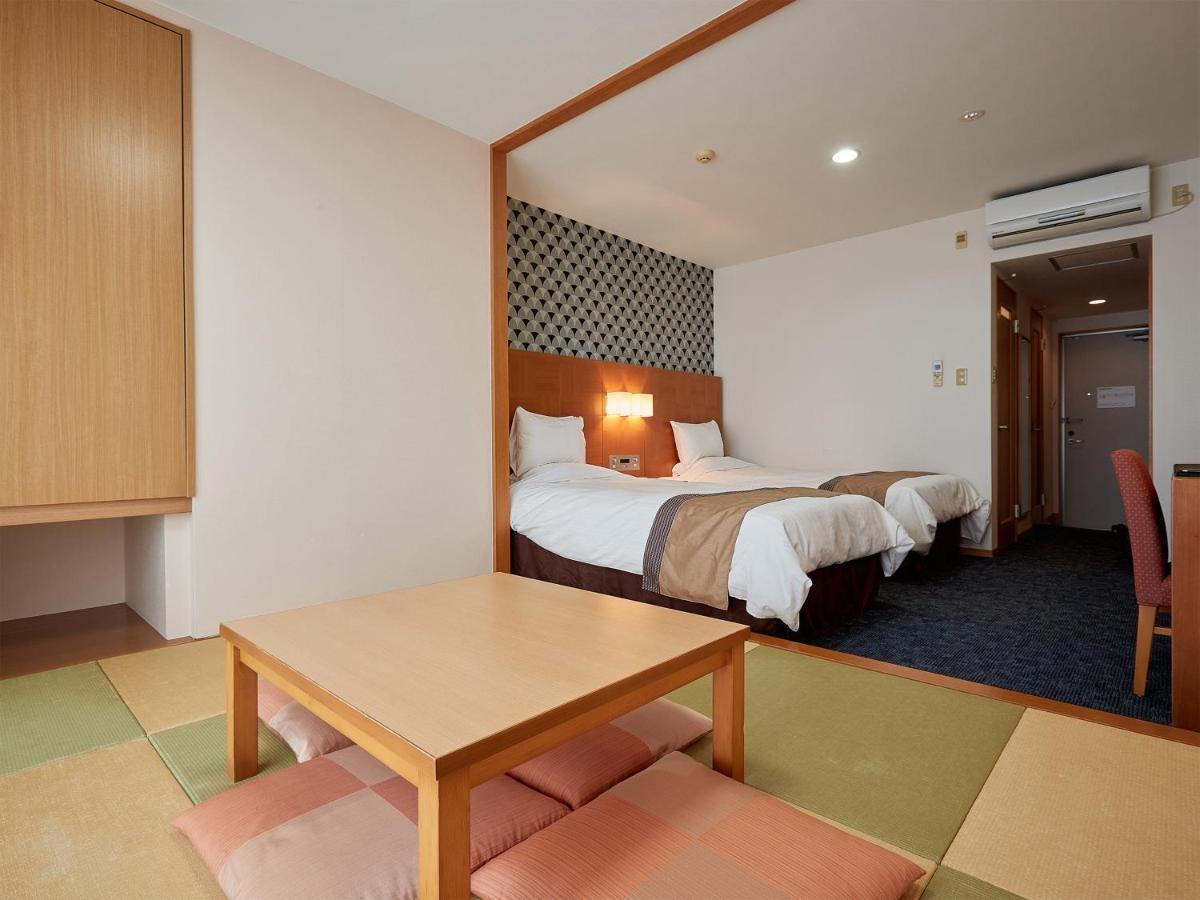 Hotel Murasakimura Yomitan Eksteriør billede