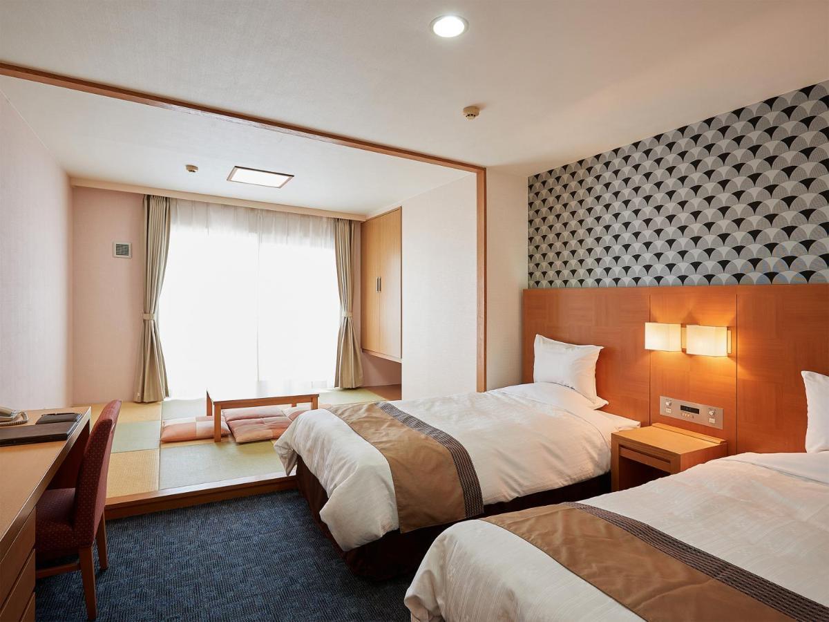Hotel Murasakimura Yomitan Eksteriør billede