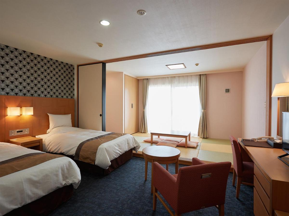 Hotel Murasakimura Yomitan Eksteriør billede